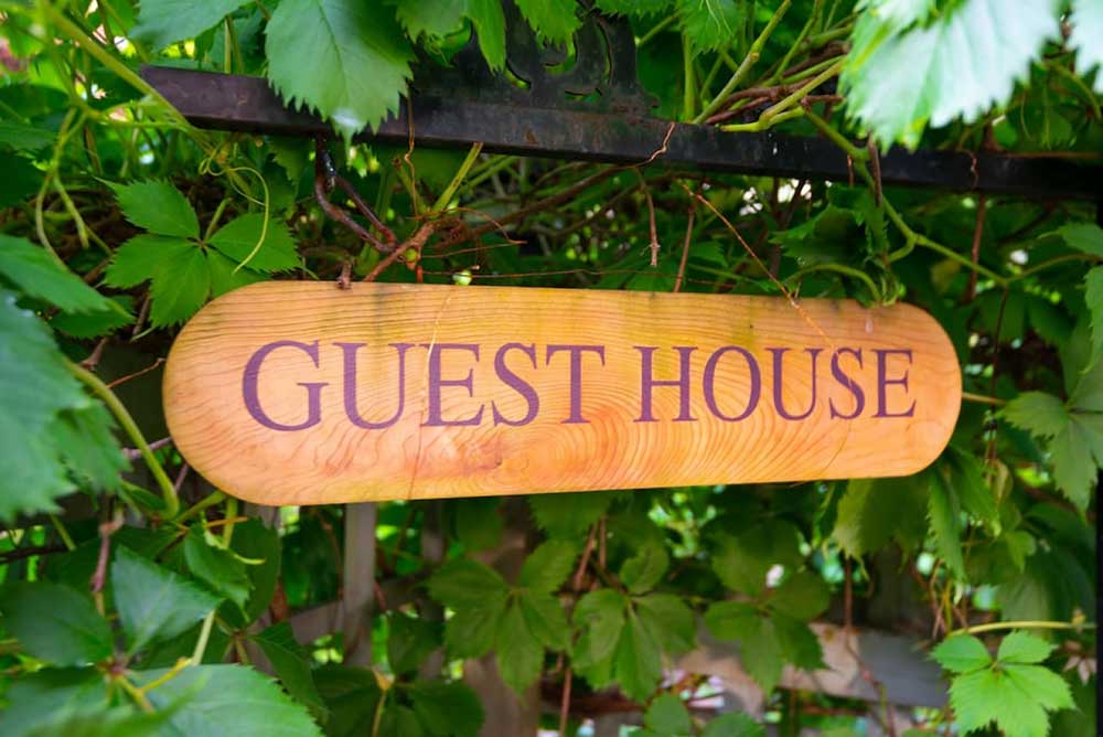 Caboose Guest House sign